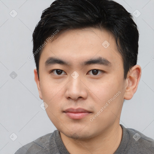 Neutral asian young-adult male with short  black hair and brown eyes