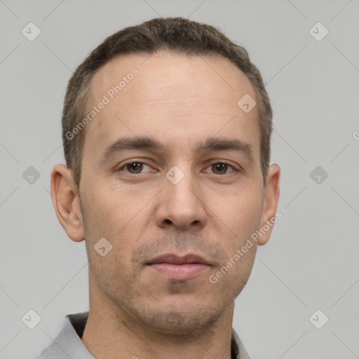 Neutral white young-adult male with short  brown hair and brown eyes