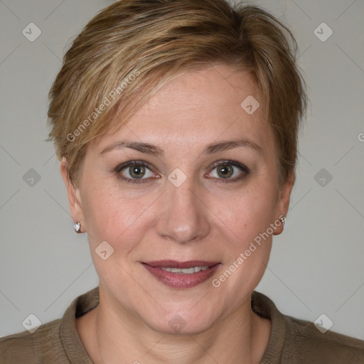 Joyful white adult female with short  brown hair and brown eyes