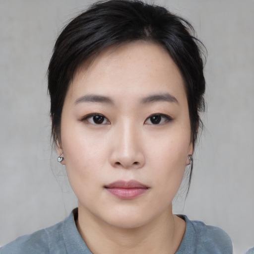 Neutral white young-adult female with medium  black hair and brown eyes