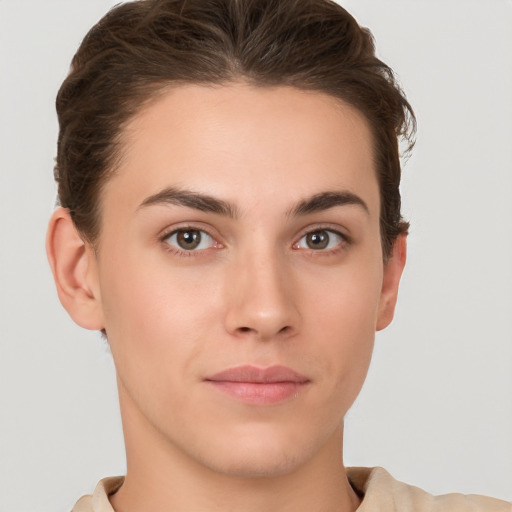 Neutral white young-adult female with short  brown hair and brown eyes