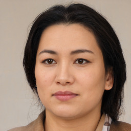 Neutral asian young-adult female with medium  brown hair and brown eyes