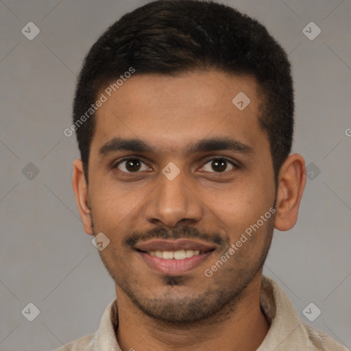Joyful latino young-adult male with short  brown hair and brown eyes