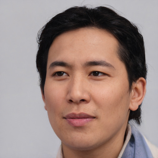 Neutral asian young-adult male with medium  brown hair and brown eyes