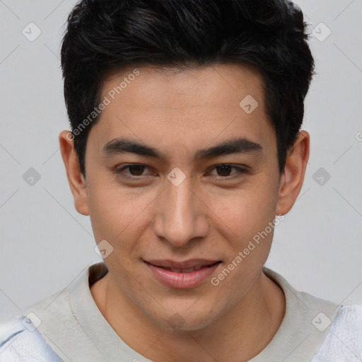 Joyful asian young-adult male with short  brown hair and brown eyes