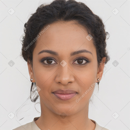 Joyful latino young-adult female with short  brown hair and brown eyes