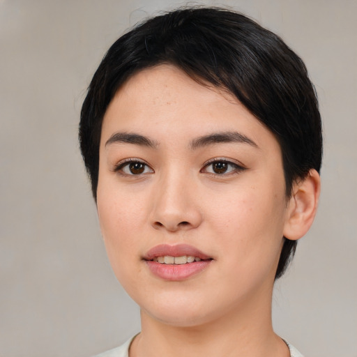 Joyful white young-adult female with medium  black hair and brown eyes