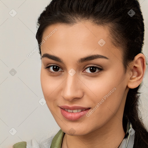 Joyful white young-adult female with long  brown hair and brown eyes