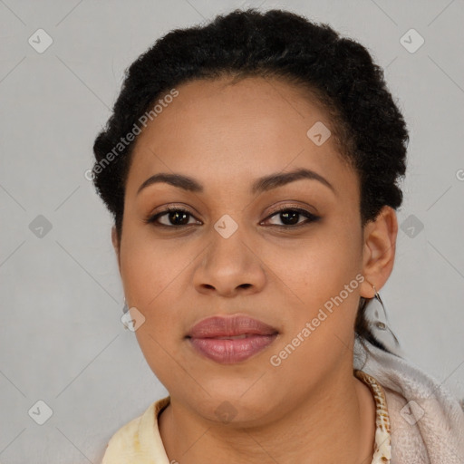 Joyful latino young-adult female with short  black hair and brown eyes