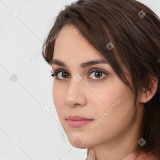 Neutral white young-adult female with medium  brown hair and brown eyes