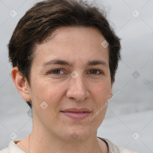 Joyful white adult female with short  brown hair and brown eyes