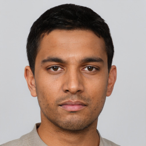 Neutral latino young-adult male with short  brown hair and brown eyes