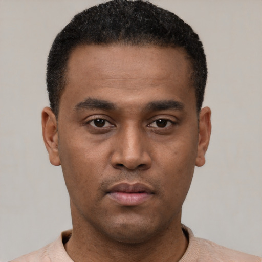 Neutral latino young-adult male with short  black hair and brown eyes