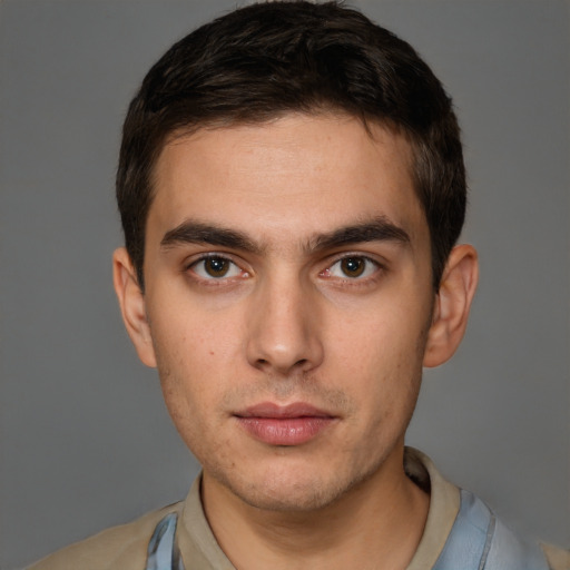 Neutral white young-adult male with short  brown hair and brown eyes