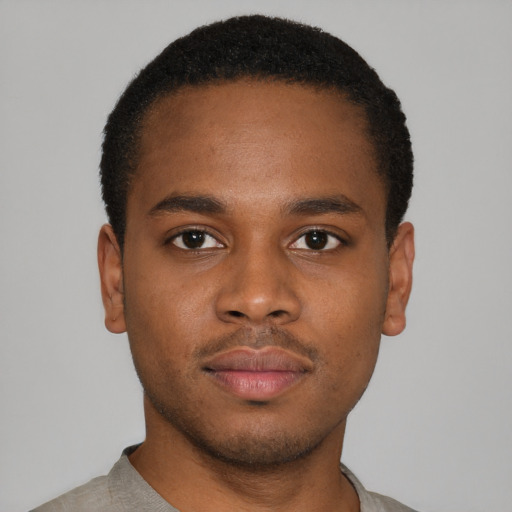 Neutral black young-adult male with short  brown hair and brown eyes