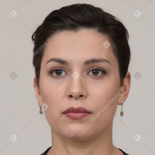 Neutral white young-adult female with short  brown hair and brown eyes