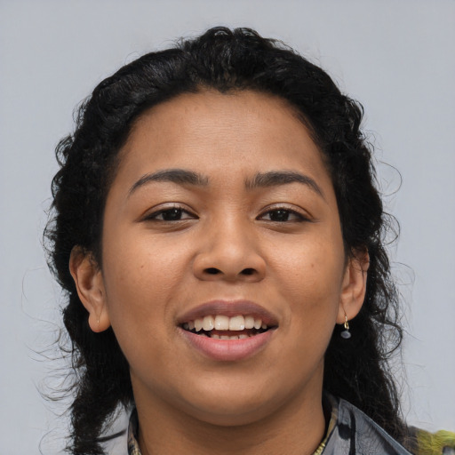 Joyful asian young-adult female with long  brown hair and brown eyes