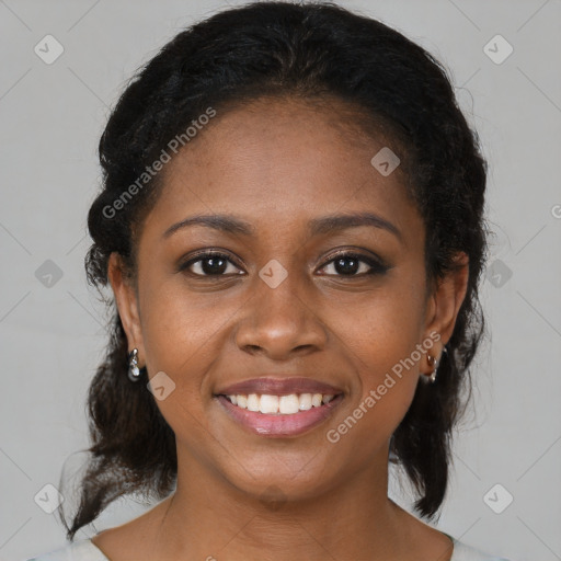 Joyful black young-adult female with medium  brown hair and brown eyes