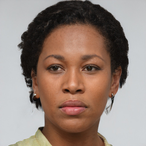 Neutral black young-adult female with short  brown hair and brown eyes