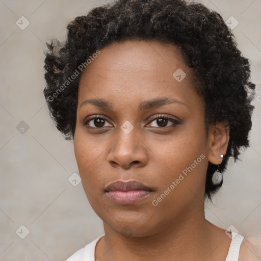 Neutral black young-adult female with short  brown hair and brown eyes