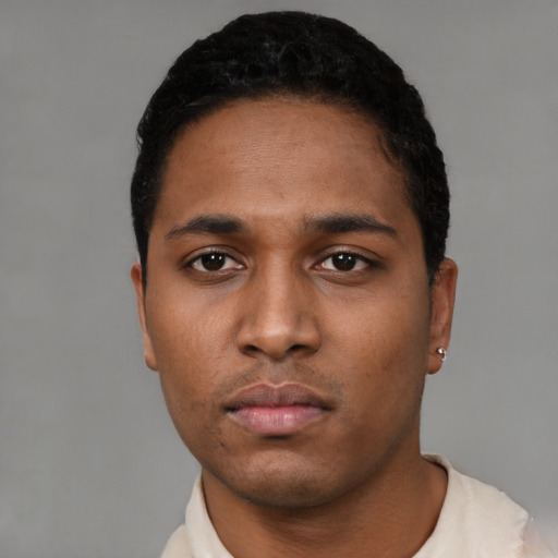 Neutral black young-adult male with short  black hair and brown eyes