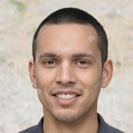 Joyful white young-adult male with short  black hair and brown eyes