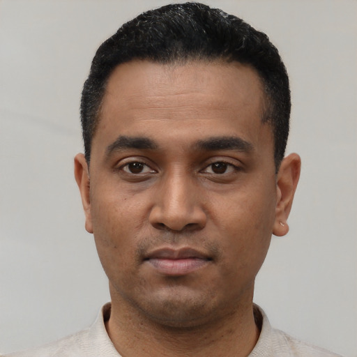 Neutral latino young-adult male with short  black hair and brown eyes