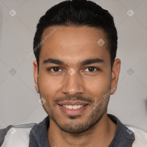 Joyful white young-adult male with short  black hair and brown eyes