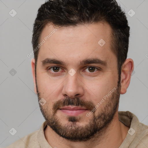 Neutral white young-adult male with short  brown hair and brown eyes