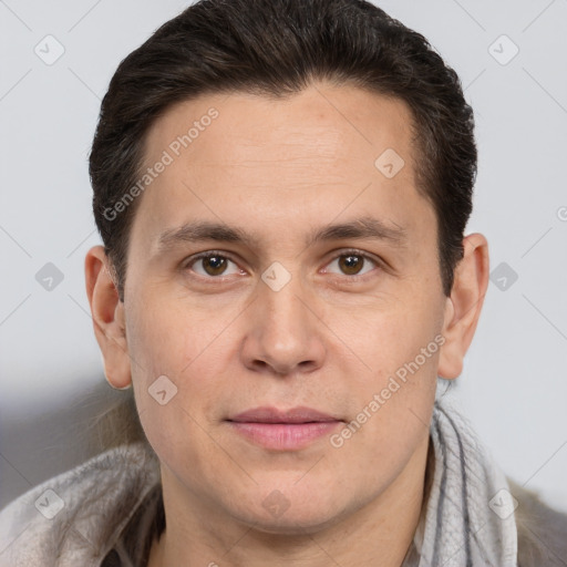 Joyful white adult male with short  brown hair and brown eyes