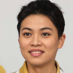 Joyful asian young-adult female with short  brown hair and brown eyes