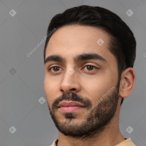 Neutral white young-adult male with short  black hair and brown eyes