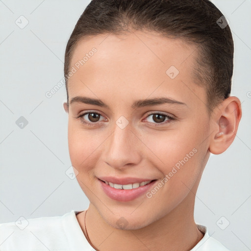 Joyful white young-adult female with short  brown hair and brown eyes