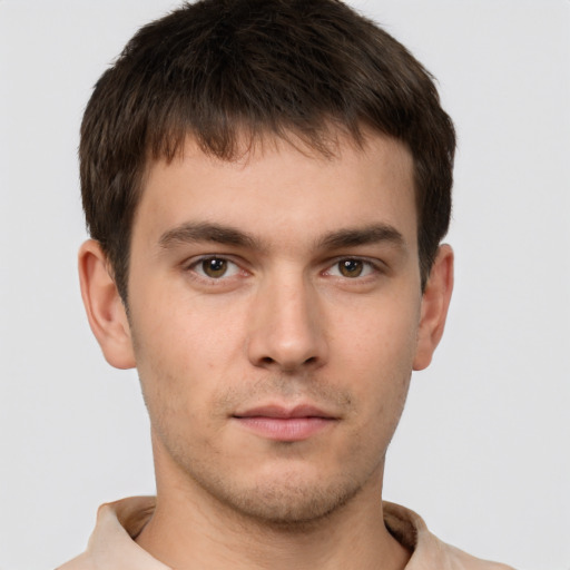 Neutral white young-adult male with short  brown hair and brown eyes