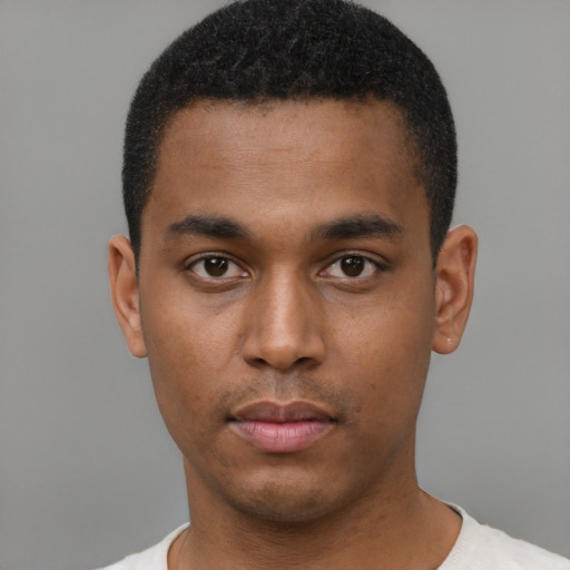 Neutral black young-adult male with short  black hair and brown eyes