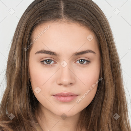 Neutral white young-adult female with long  brown hair and brown eyes