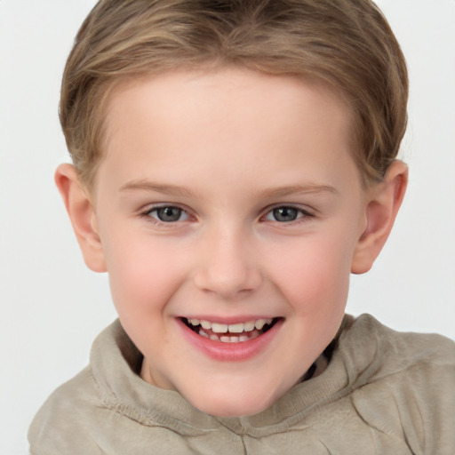 Joyful white child female with short  brown hair and grey eyes