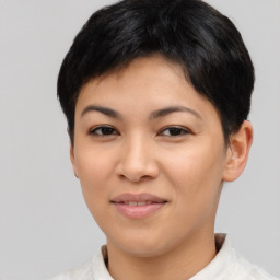 Joyful asian young-adult female with short  brown hair and brown eyes