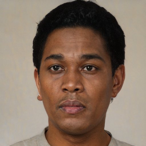Neutral black adult male with short  black hair and brown eyes