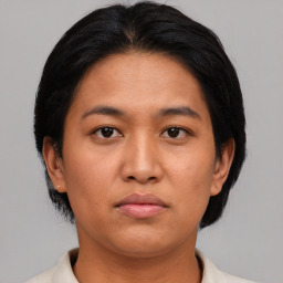 Neutral asian young-adult female with short  black hair and brown eyes