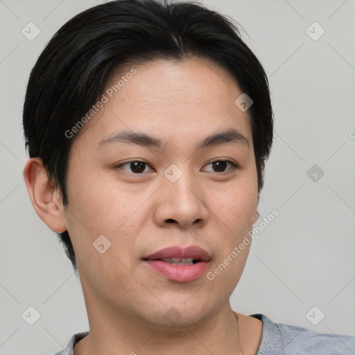 Joyful asian young-adult female with short  brown hair and brown eyes