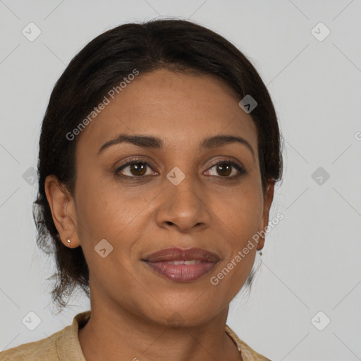 Joyful black young-adult female with medium  brown hair and brown eyes