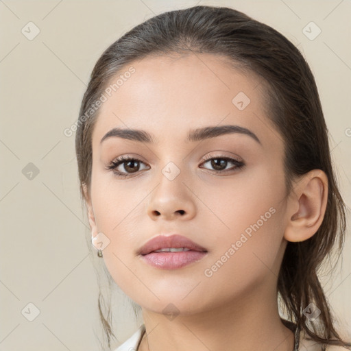 Neutral white young-adult female with medium  brown hair and brown eyes