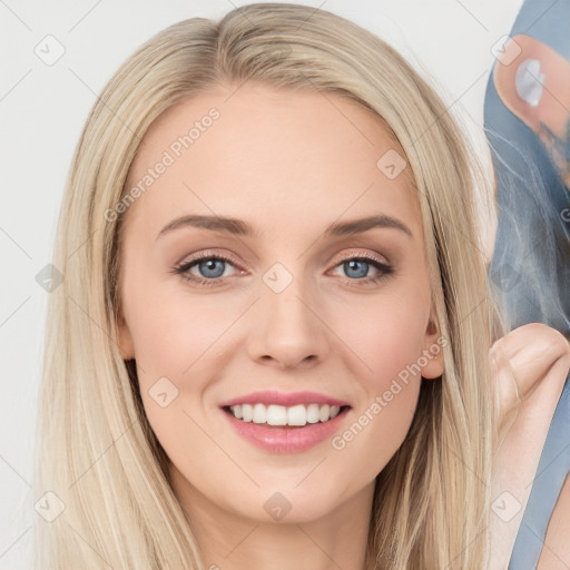 Joyful white young-adult female with long  brown hair and blue eyes