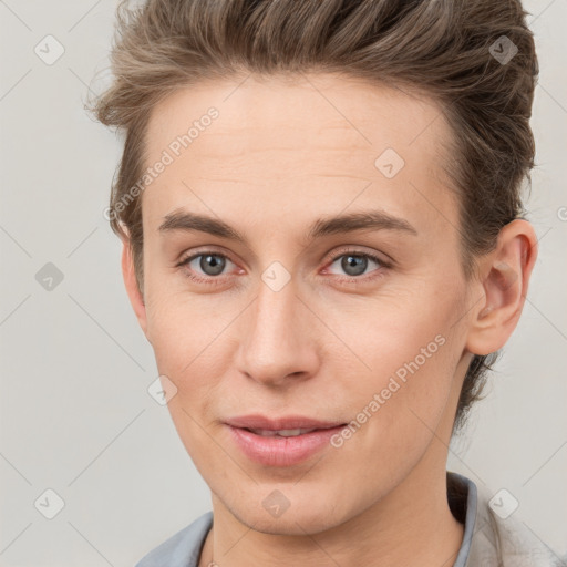 Joyful white young-adult female with short  brown hair and grey eyes