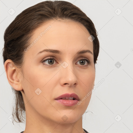 Neutral white young-adult female with medium  brown hair and brown eyes