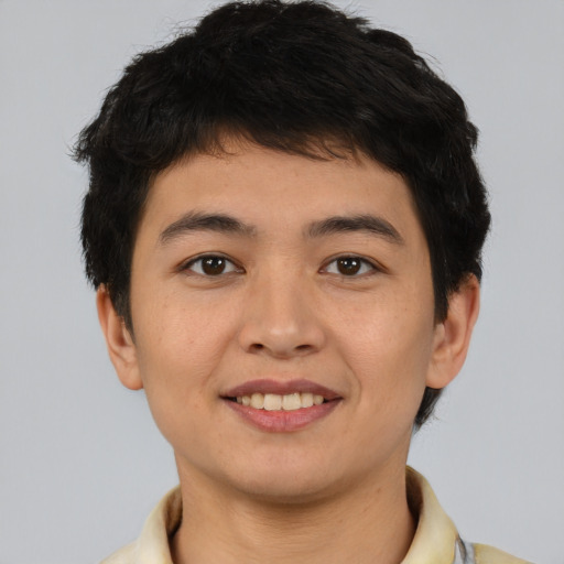 Joyful asian young-adult male with short  brown hair and brown eyes