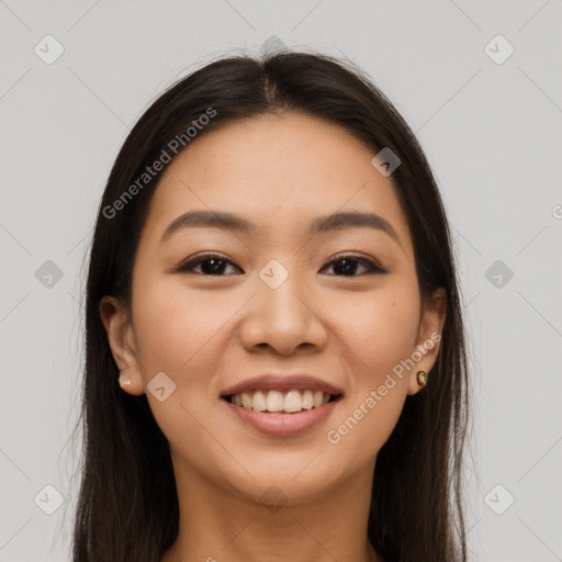 Joyful white young-adult female with long  brown hair and brown eyes