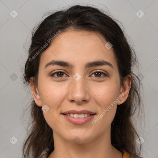 Joyful white young-adult female with medium  brown hair and brown eyes