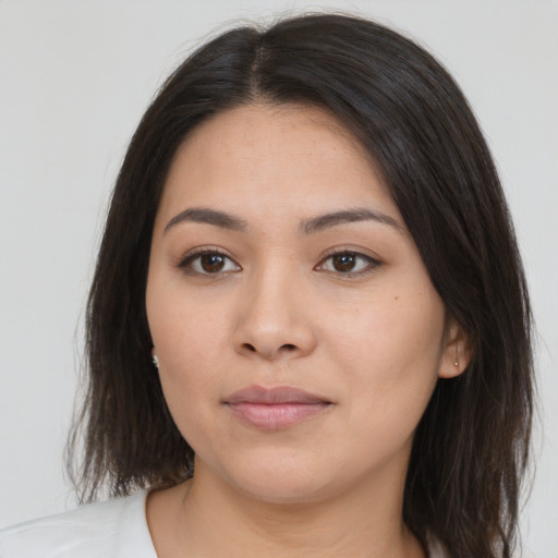 Neutral asian young-adult female with medium  brown hair and brown eyes